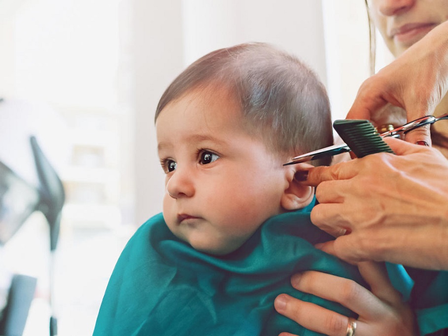 cutting toddler boy hair with scissors